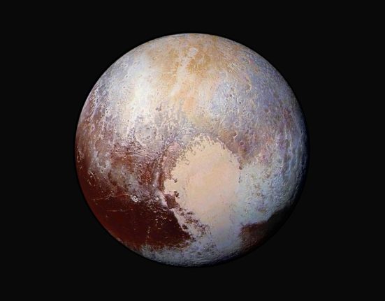 An image of Pluto's Sputnik Planitia, a large basin likely formed from an impact billions of years ago.