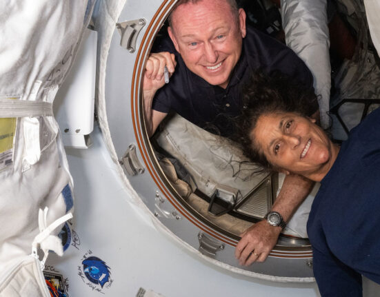 Astronauts Sunita Williams and Butch Wilmore float in the International Space Station.