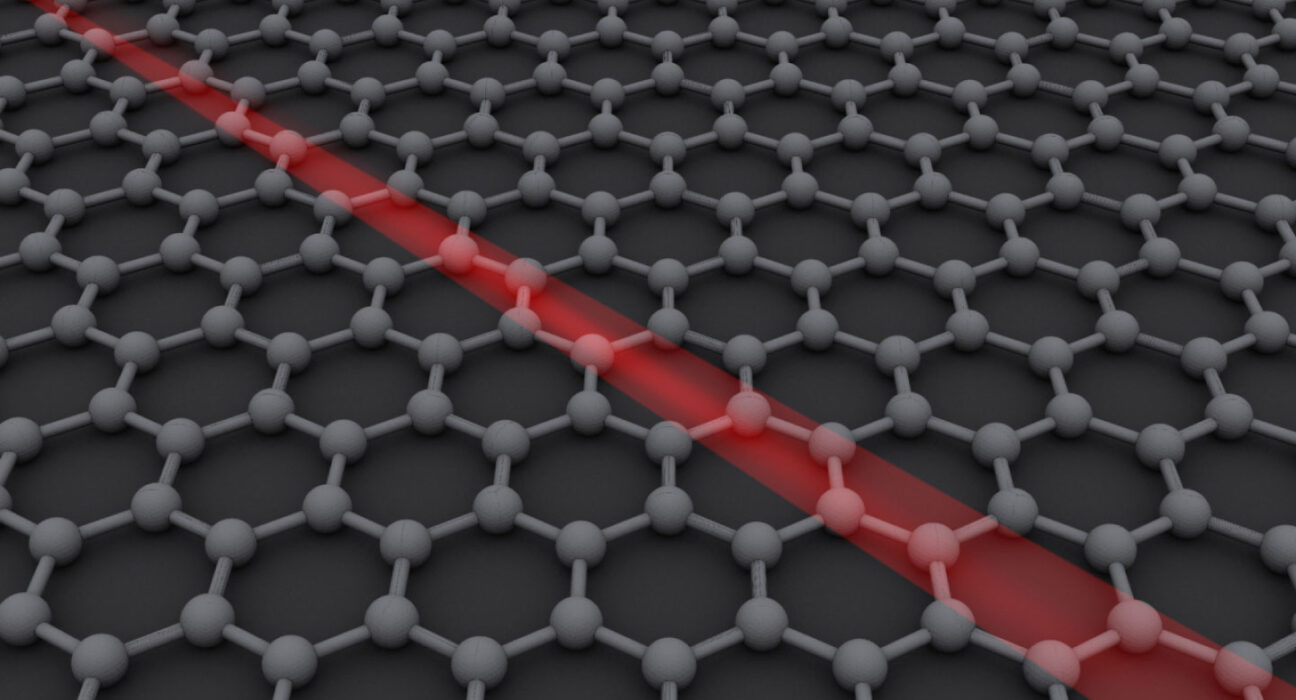 This illustration of a sheet of graphene shows a grid of connected atoms with a red streak going diagonally across it.