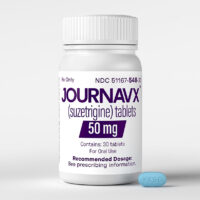 An image of a pill bottle labeled JOURNAVX with a little blue pill beside it.